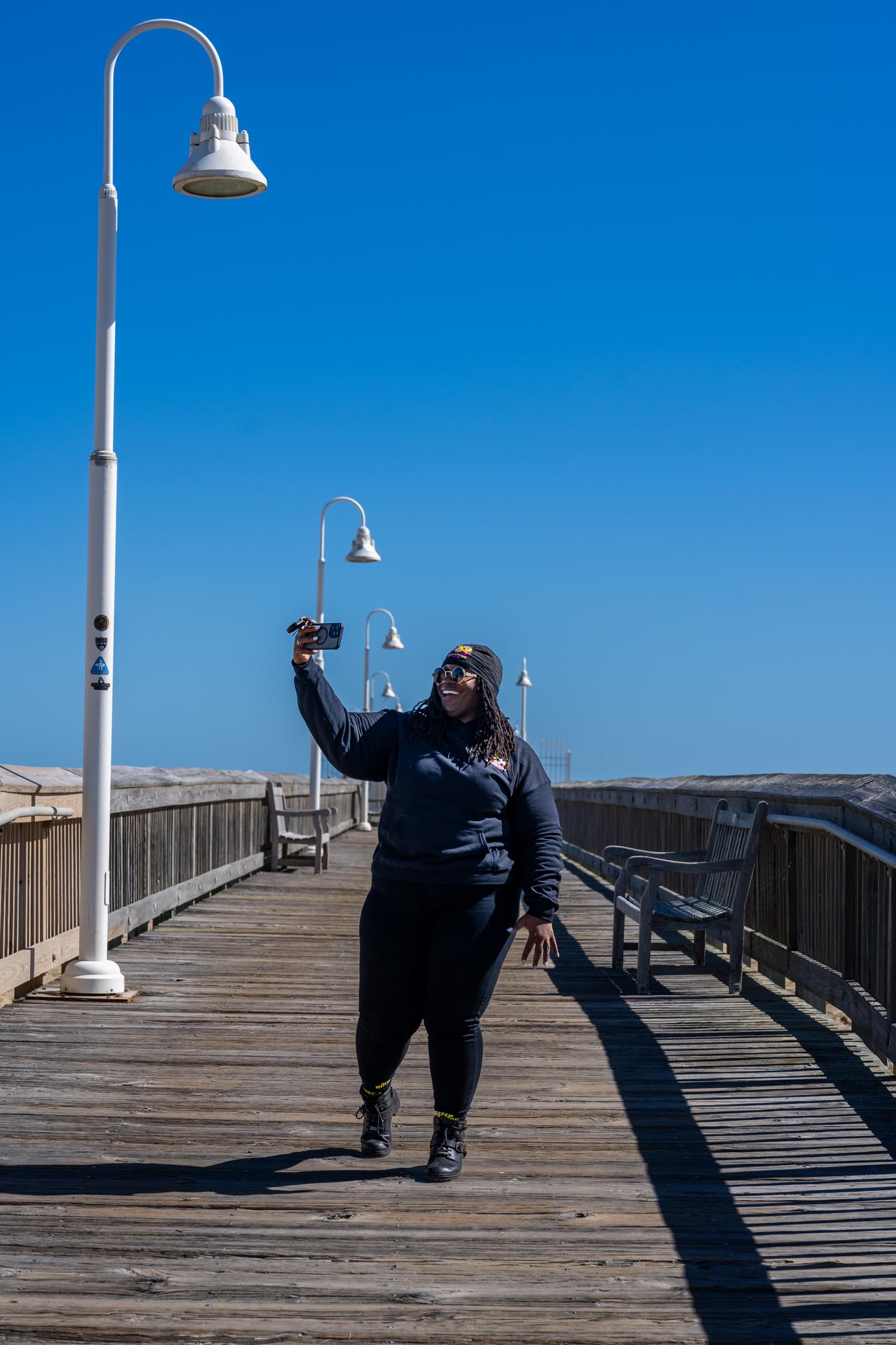 Rho Caldwell records for her Youtube Channel, bringing together the motorcycling community.