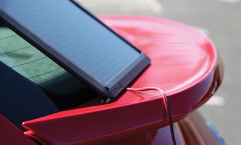 Portable photovoltaic solar panel converting sunlight into power.